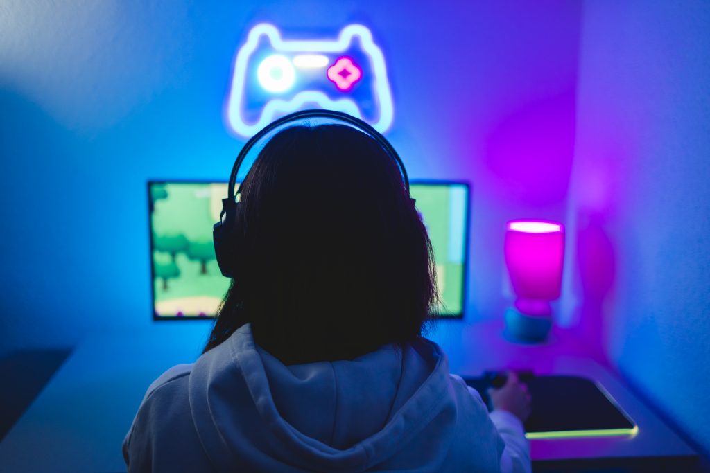Content creator using Soundful, an AI music generator to create music for her gaming stream
